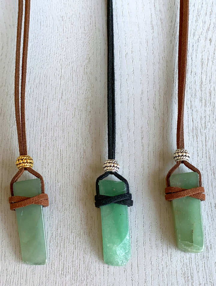 Raw Green Aventurine pendant necklace, Aventurine gemstone necklace, Spiritual healing stone Aventurine necklace, Aventurine crystal pendant, Handmade Aventurine necklace for energy healing, Green Aventurine gemstone necklace gift idea, Natural Green Aventurine jewelry piece, Aventurine stone necklace in sunlight, Delicate Green Aventurine necklace with gold aztec bead.