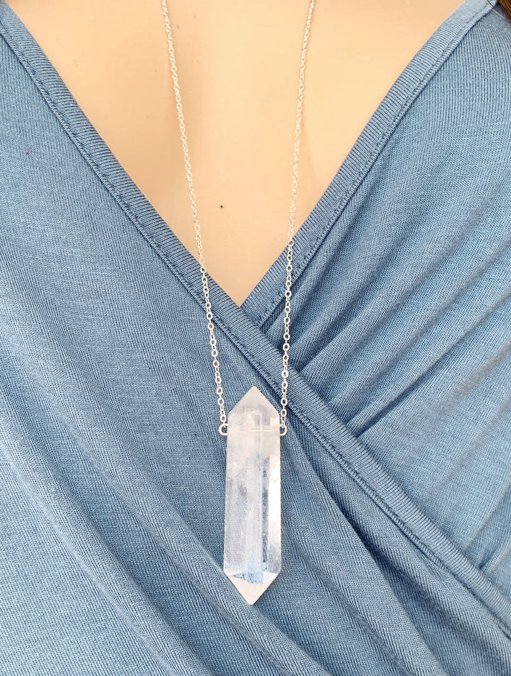 Natural Clear Quartz Necklace, April Birthstone Jewelry, Clear Quartz Jewelry, Large quartz necklace with silver chain, Natural quartz crystal pendant necklace, Handmade large quartz stone necklace, Quartz healing crystal necklace, Large raw quartz gemstone pendant, Boho large quartz pendant jewelry, Minimalist clear quartz necklace, Statement raw quartz necklace, Crystal energy quartz pendant, Large quartz crystal necklace, Quartz pendant with sterling silver chain, Handcrafted quartz crystal jewelry.